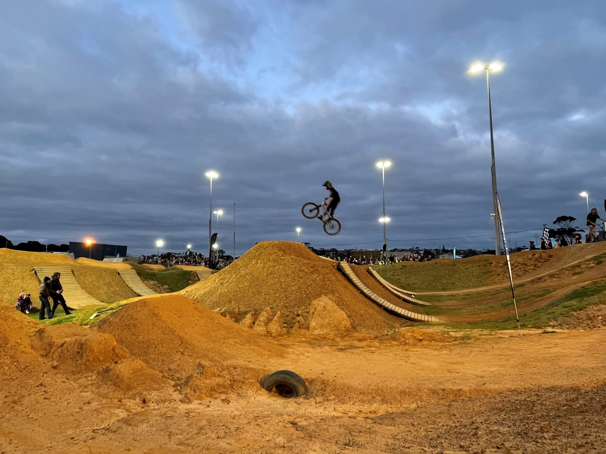 A person mid air on a bike