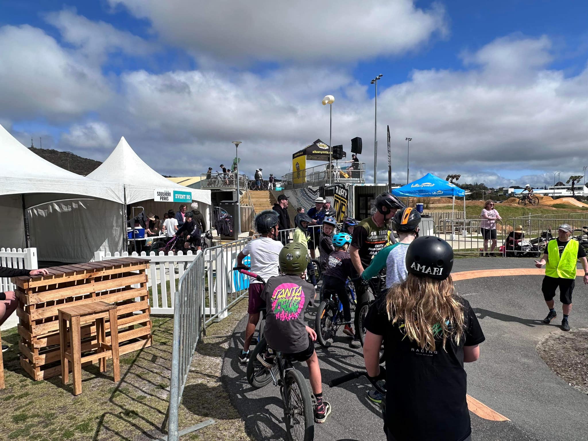 People lining up to go on a bike track
