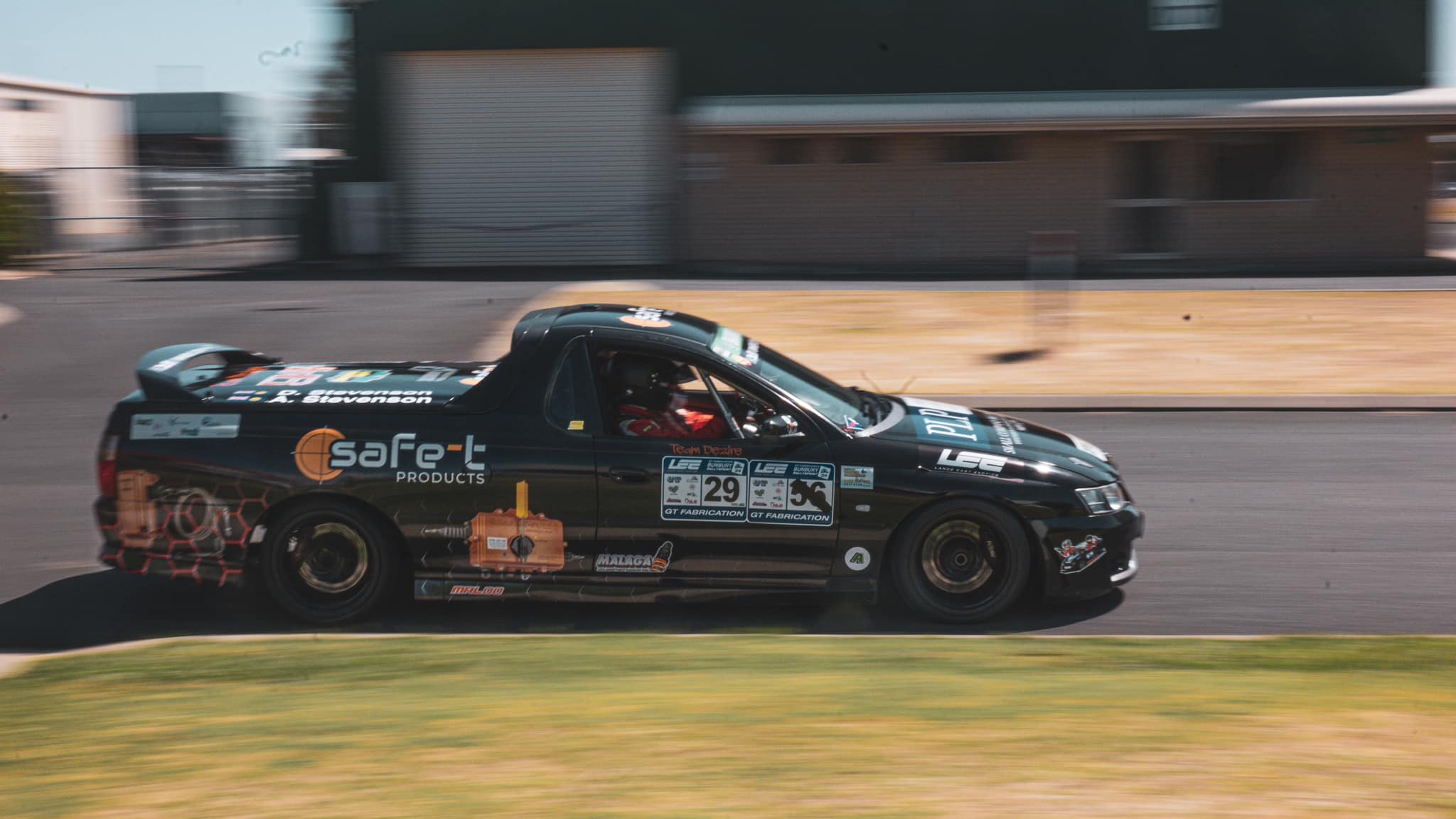 Car racing down track